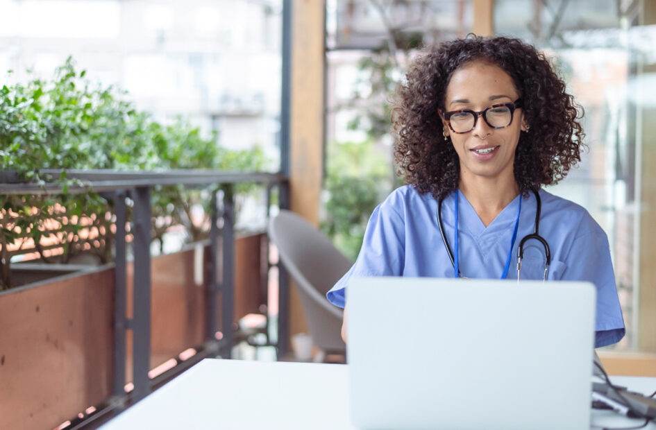 nurse watching a webinar