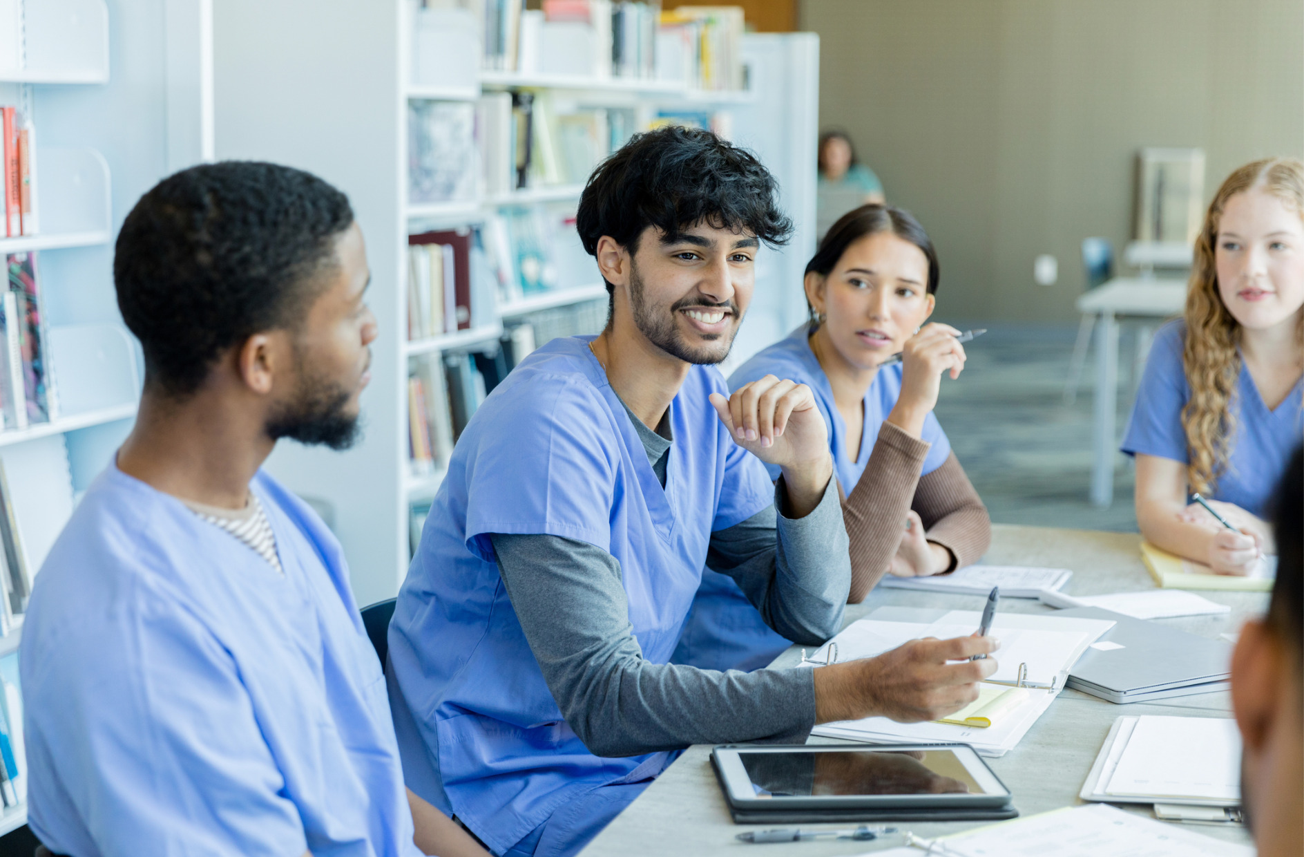 small group of pharmacy students studying together
