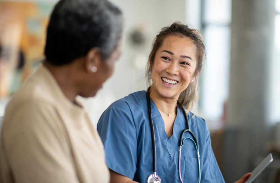 nurse talking with patient
