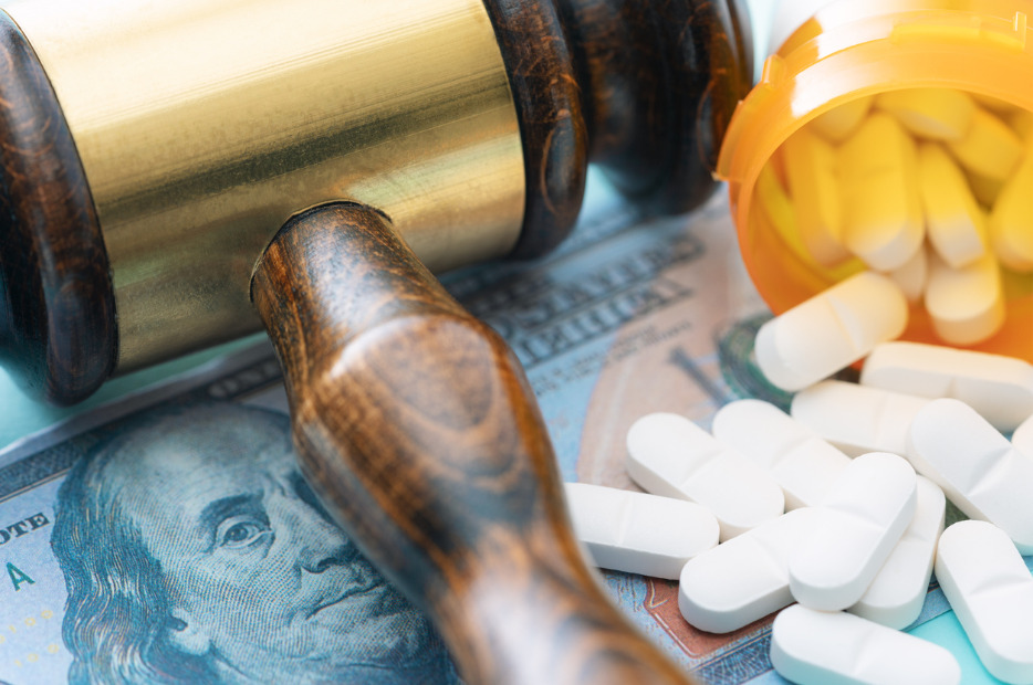 prescription drugs, judges gavel, and money