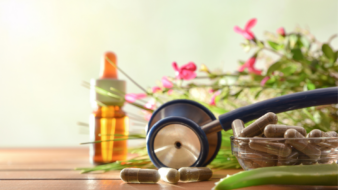 natural medicine and supplements with a stethoscope