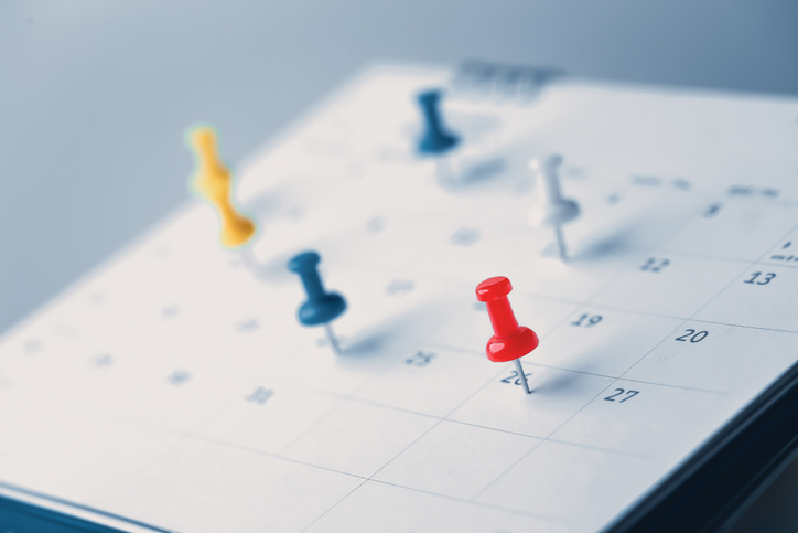 calendar with push pins
